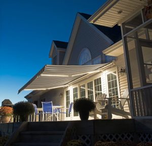 Beautiful awning lit up at night with LEDs at dusk